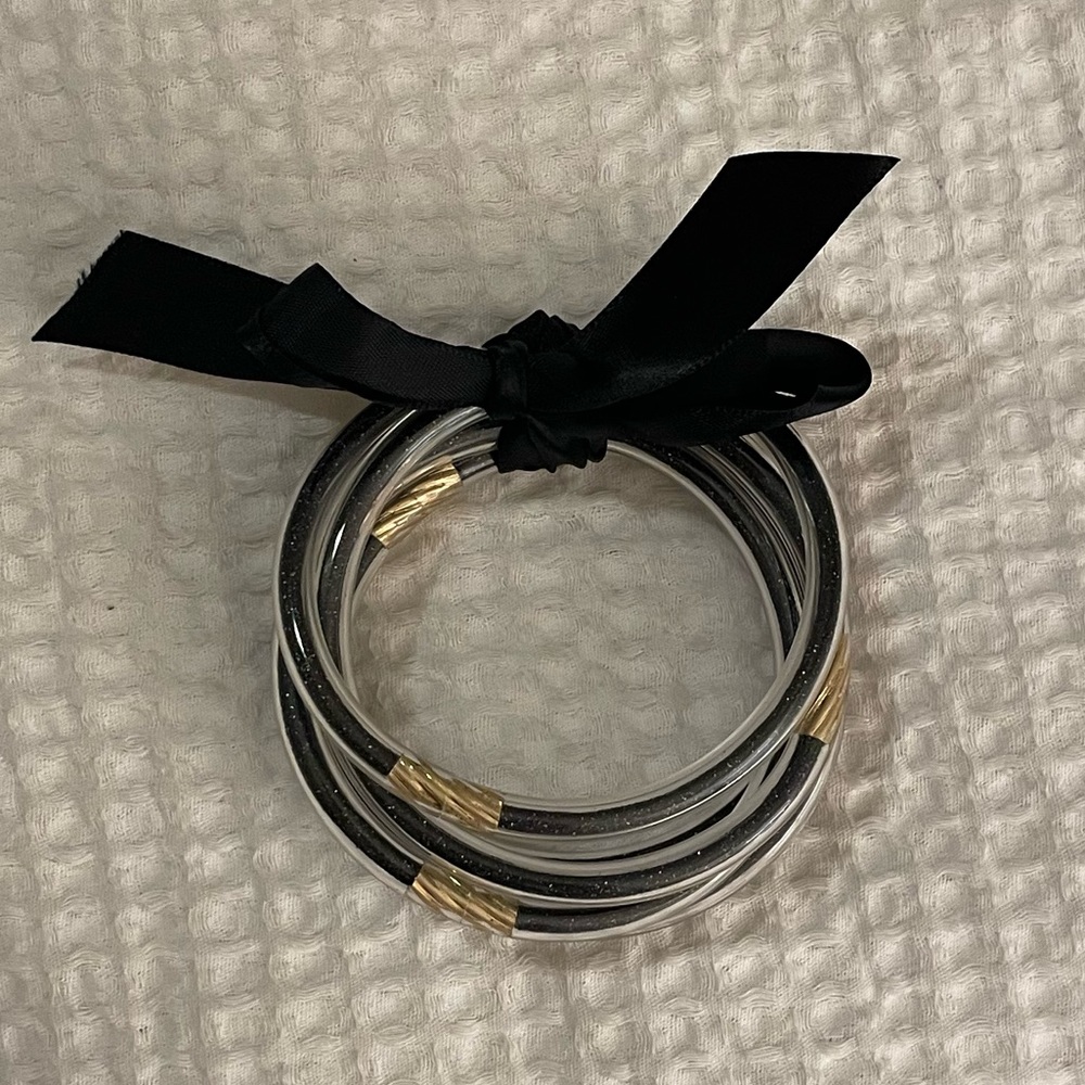 Waterproof black glitter bangles with gold accents!